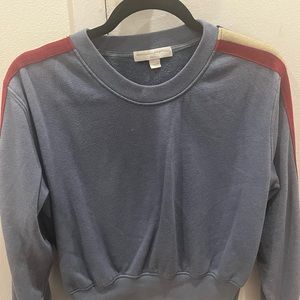 Spiritual Gangster blue sweater with shiny red, cream, and blue lining; size xs